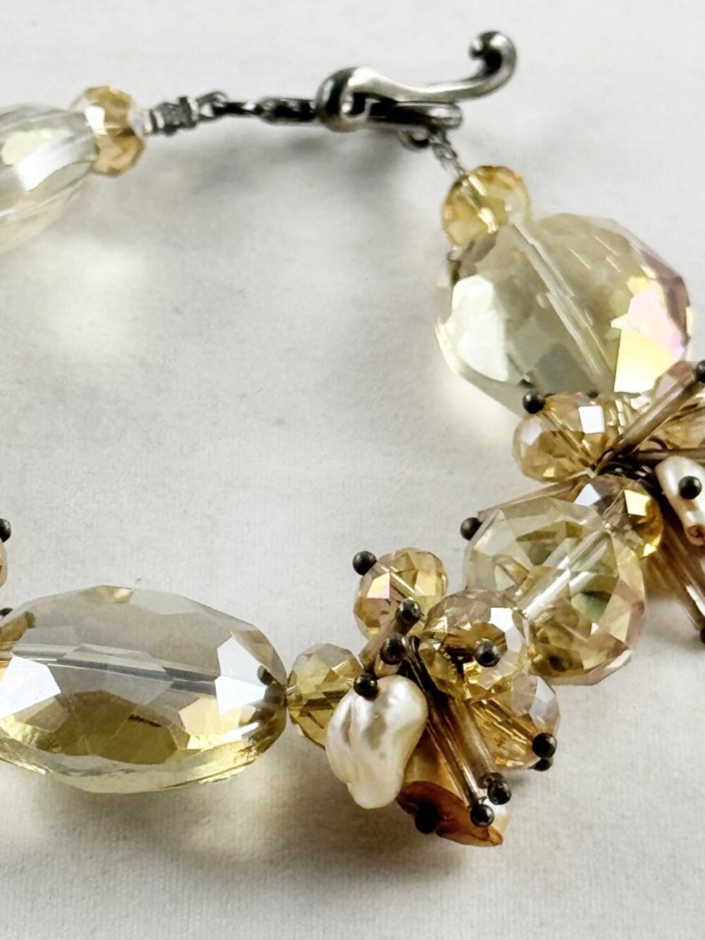 Bold gold colored crystal bracelet, freshwater pearls